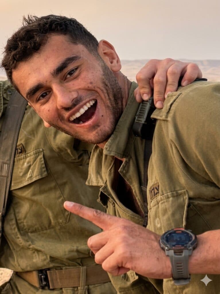 Staff Sgt. Adam Tzarfati smiles while wearing an IDF uniform.