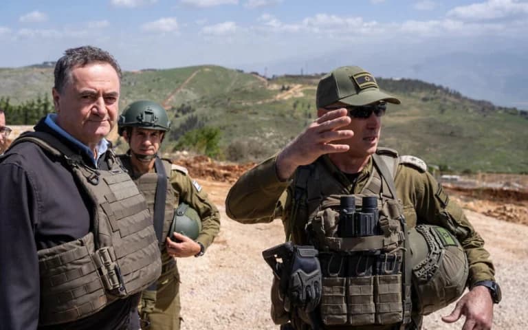 Defense Minister Israel Katz and IDF Northern Command chief Maj. Gen. Ori Gordin stand at an Israeli military post in southern Lebanon.