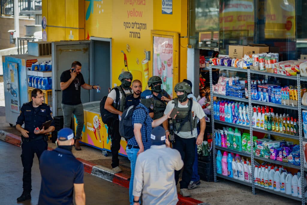 Security and rescue forces at the scene of a terror attack near Kochav Yair.
