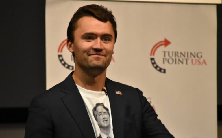 Charlie Kirk with Turning Point USA background