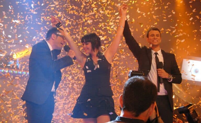 Contestants celebrating on stage during the Big Brother Israel finale.