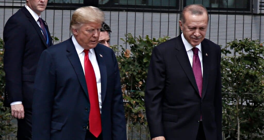 President Donald Trump walking beside Turkish President Recep Tayyip Erdoğan.