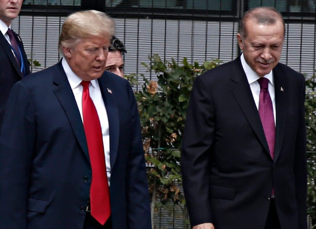 President Donald Trump walking beside Turkish President Recep Tayyip Erdoğan.
