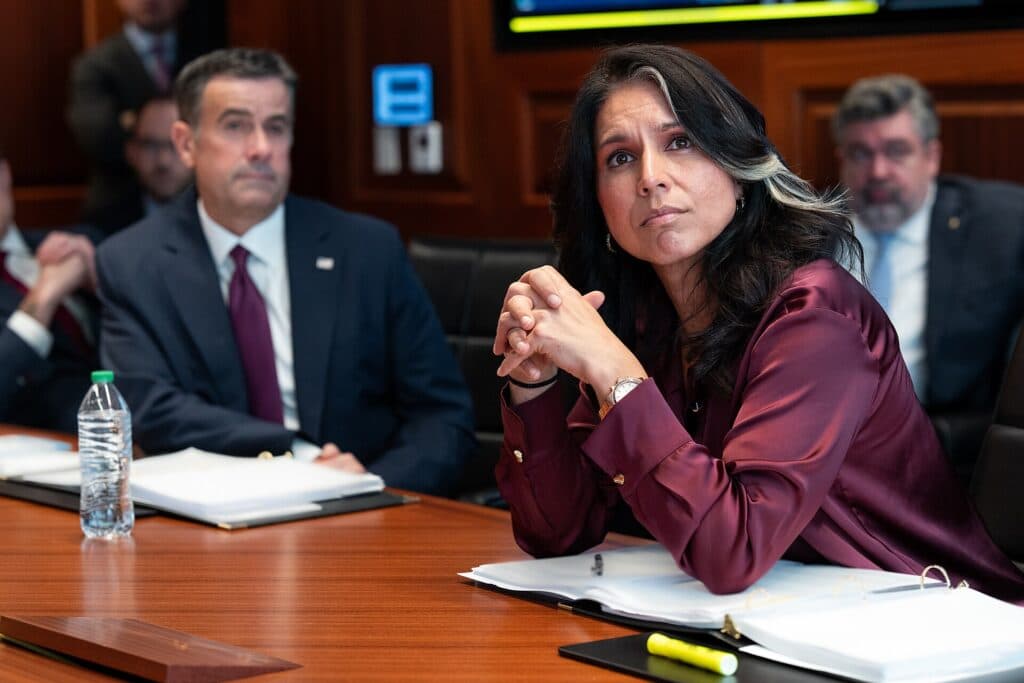 Tulsi Gabbard seated in the White House Situation Room during a meeting.