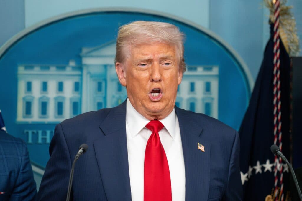 President Donald Trump speaking in the White House press briefing room.