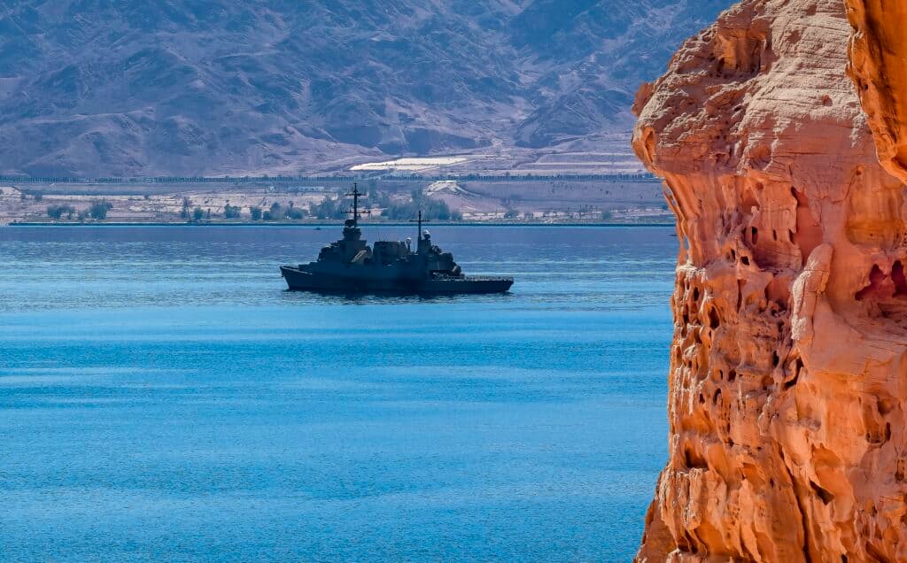 Oil tanker sailing through a major Middle East shipping route.