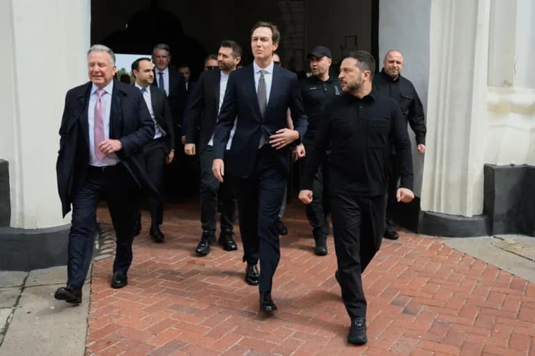 Ukrainian President Volodymyr Zelenskyy walking with U.S. envoys Jared Kushner and Steve Witkoff in Kyiv.