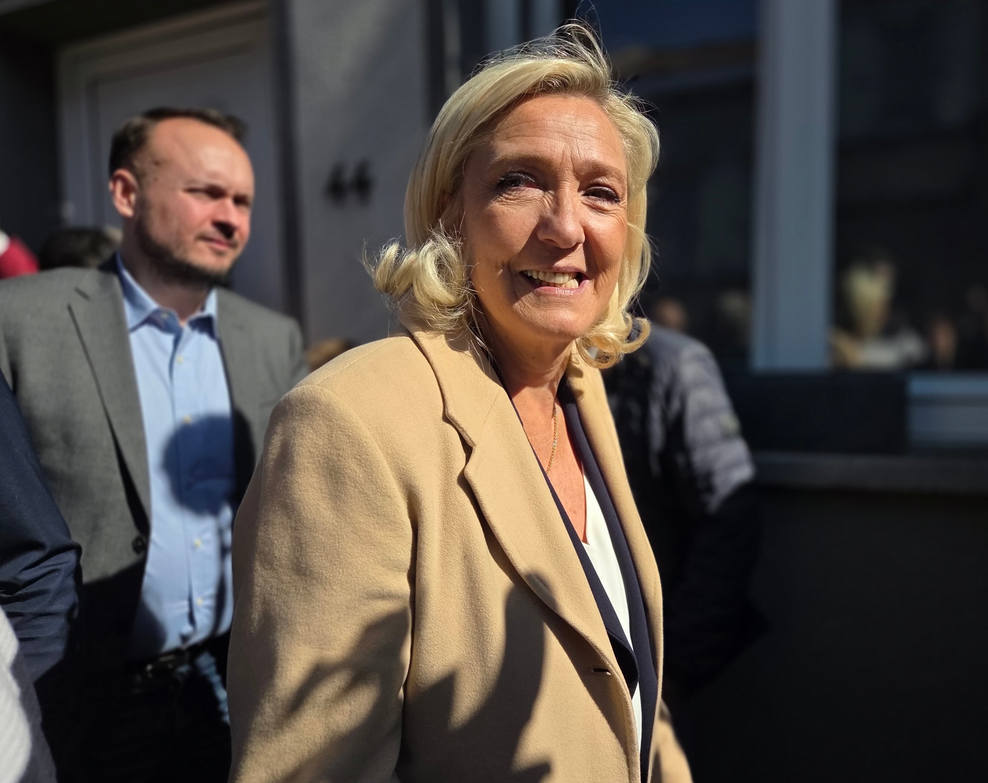 Marine Le Pen speaks with supporters during a visit to Billy-Montigny, France.