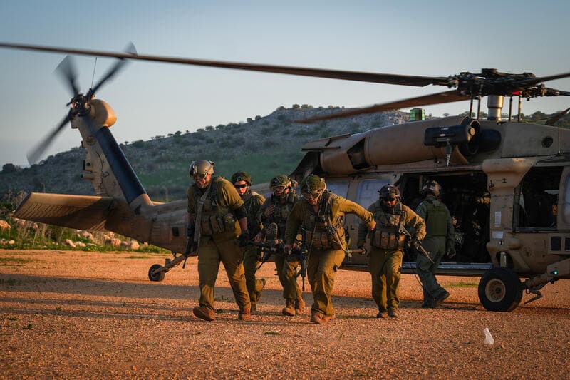 Israeli soldiers take part in a military drill simulate the evacuation of wounded soldiers with helicopters, in the Golan Heights, northern Israel, February 7,…