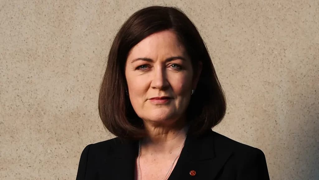Australian Senator Sarah Henderson standing against a plain wall.