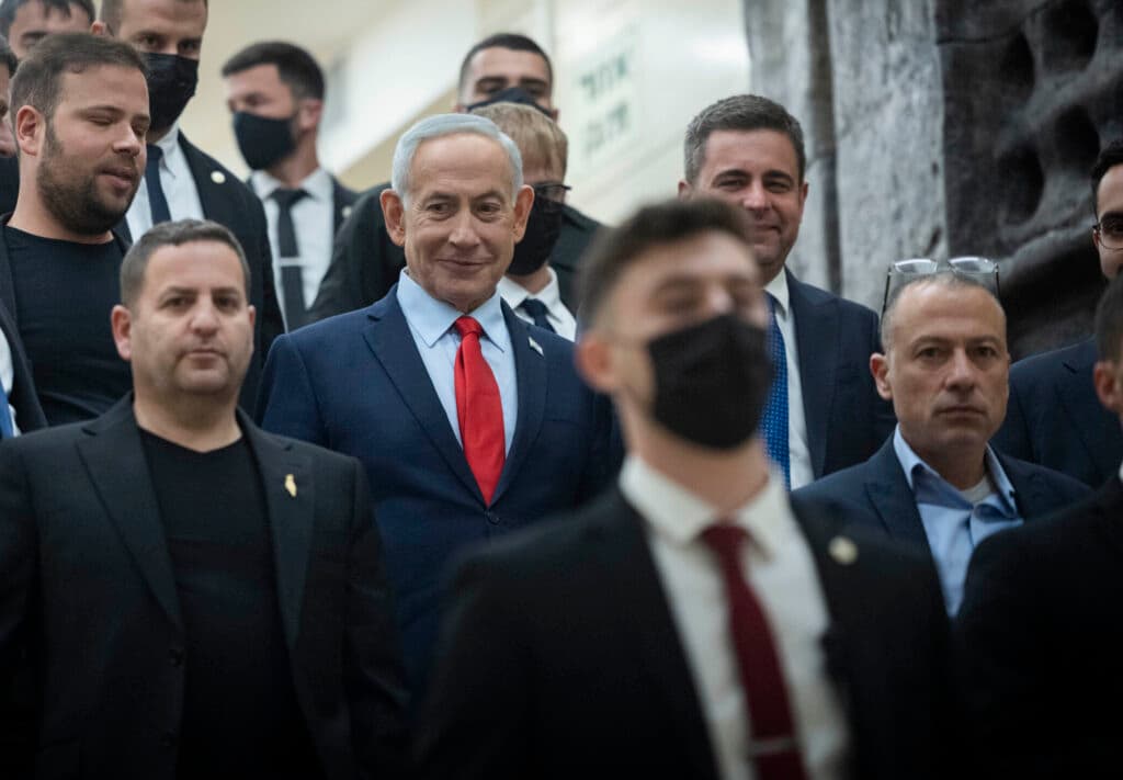 Prime Minister Benjamin Netanyahu walks outside his office at the Knesset.